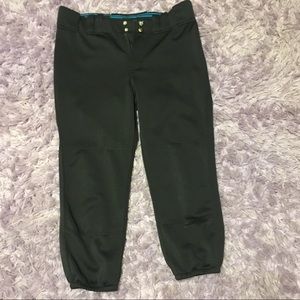 Two pairs of softball pants and a sliding shorts